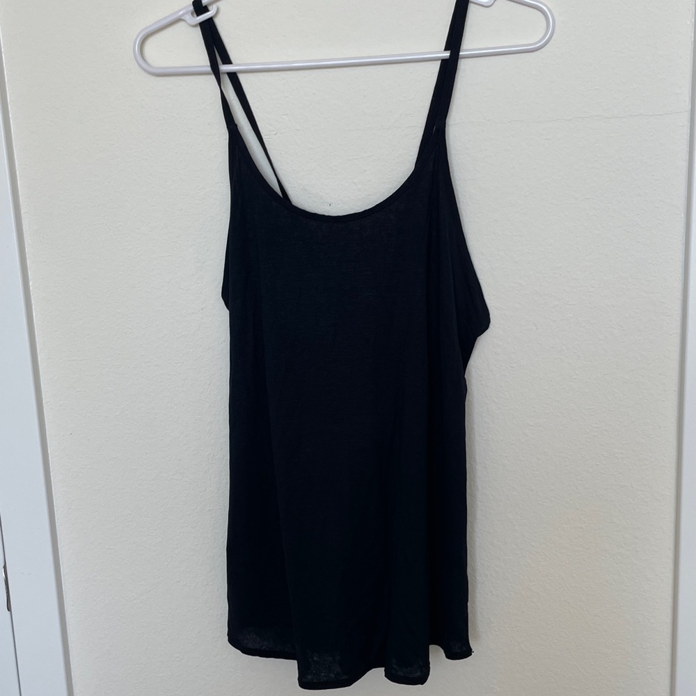 Black criss cross back tank top for exercise, dance or casual look with jeans